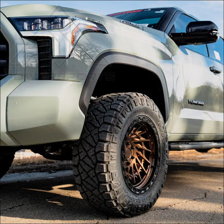 Typhoon Truck | Smoked Bronze Center Gloss Black Lip - Wheels